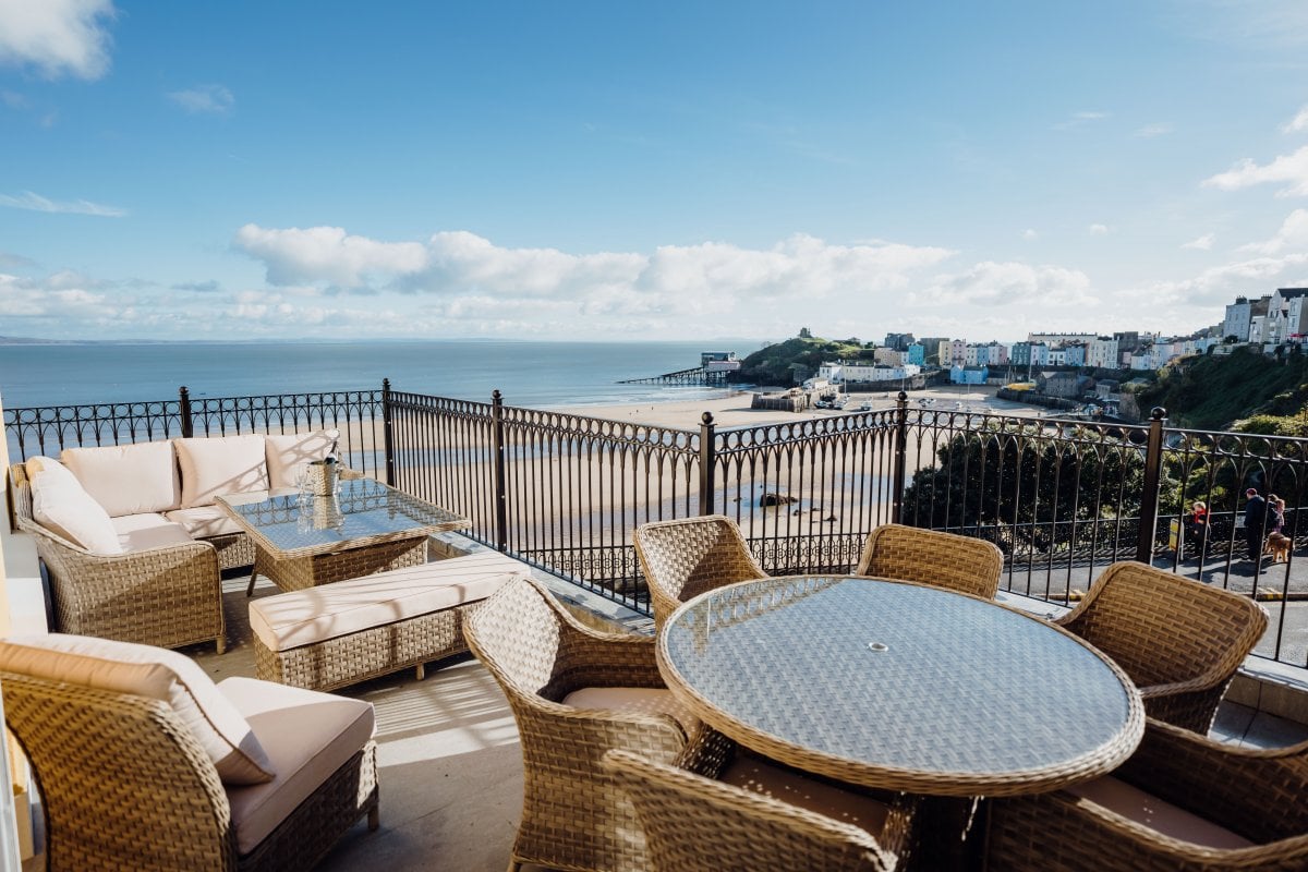 Ocean House - outside seating area with amazing beach views